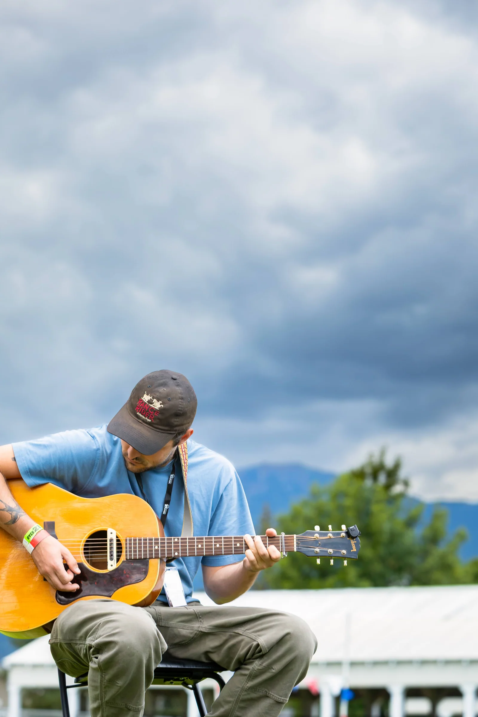 Morgan McHugh under a big sky at the Wallowa County Fairgrounds in the first hour of Juniper Jam, September 5, 2026.